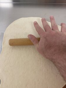 Roll out a bit of dough from your bucket to be the size of about 8 1/2 x 11 (sheet of typing paper).