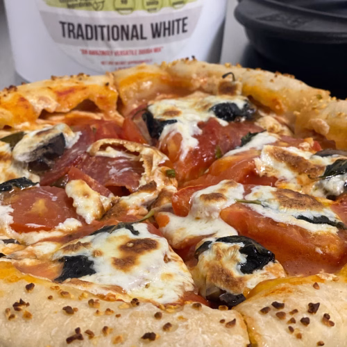 Cast Iron Pizza Homemade with Bucket of Bread