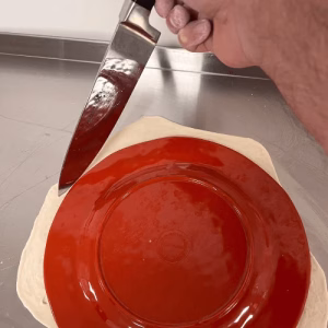 Cut the dough ball for the Easy Autumn Apples and Spice Galette at Bucket of Bread