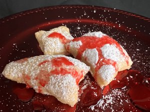 Optional twist with either raspberry or strawberry syrup when making beignets with Bucket of Bread