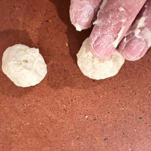 Old Bones Breadsticks making balls for this Easy Halloween breadstick recipe